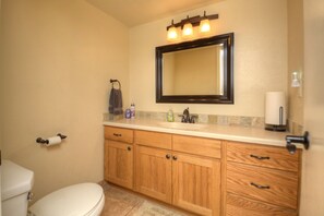 Combined shower/bathtub, hair dryer, towels, soap