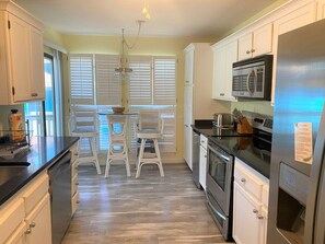 Fridge, microwave, oven, stovetop - 8 Fairway Club - Golf Course & Pond Views - Owner 6 Passenger Cart Incl. (Fripp Island)
