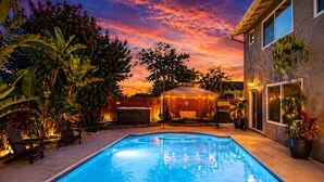 A swimming pool with a patio area, a hot tub, and a covered seating area. - Clear Sky Paradise - Pool, Spa & Sunset Vibes (San Diego)