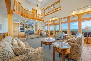 Flat-screen TV, DVD player, books, stereo