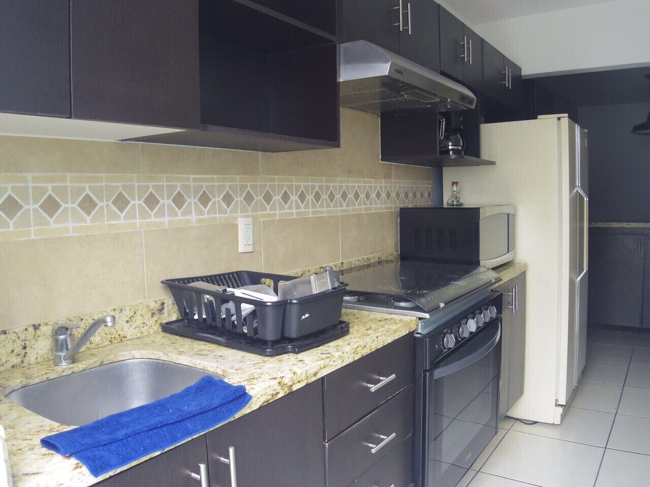 Microwave, coffee/tea maker, cookware/dishes/utensils