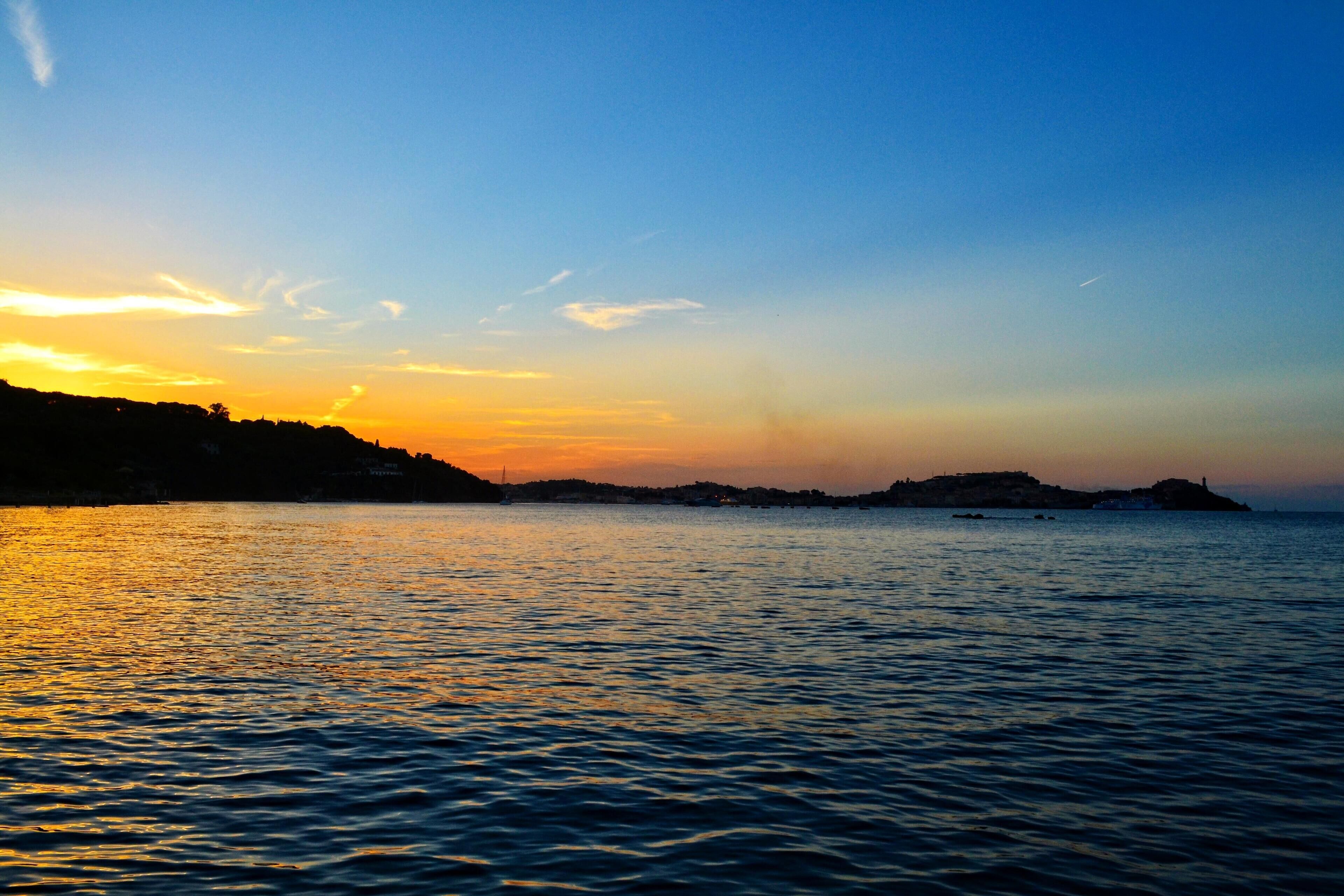 On the beach, sun-loungers