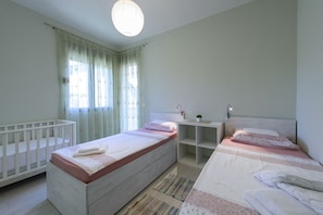 3 bedrooms, desk, iron/ironing board, travel cot