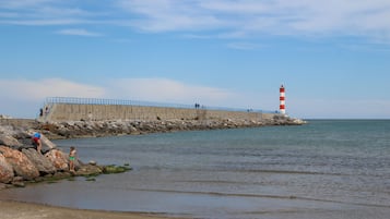 Beach nearby, sun loungers