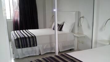 1 habitación, tabla de planchar con plancha, internet y ropa de cama