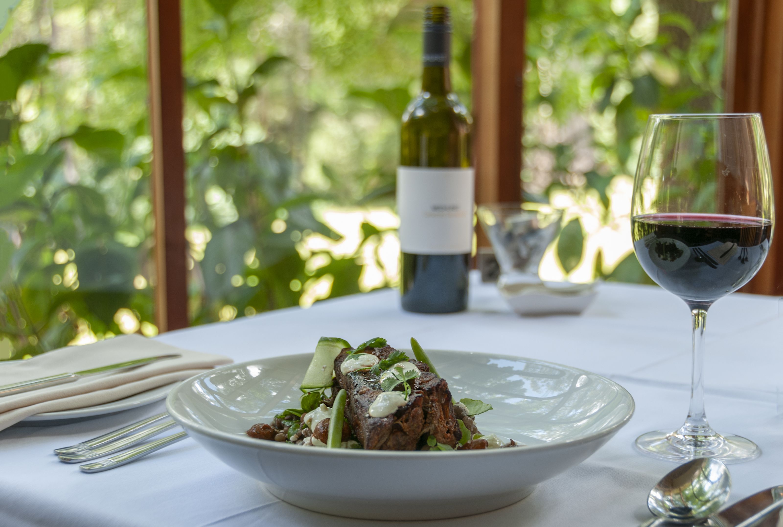 breakfast, lunch served; local and international cuisine, garden views