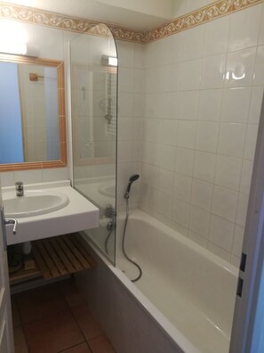 Bañera, secador de pelo