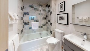 Bathtub, hair dryer, towels