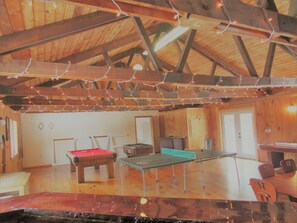 Enjoy a game of ping pong, pool, or billiards in this spacious indoor recreational area.