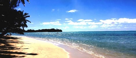 On the beach, sun-loungers, beach towels