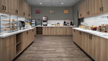 A modern kitchen with wooden cabinets, a central island, and various appliances.
