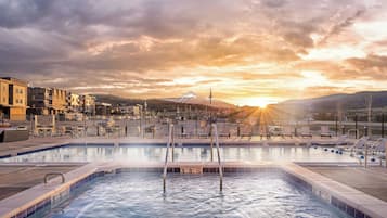 Outdoor pool, open 6:00 AM to 10:00 PM, pool umbrellas, pool loungers