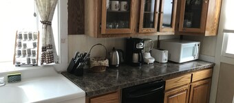 Vintage Cabin with Hot Tub, Convenient in-Town Location & Mountain Views! 
