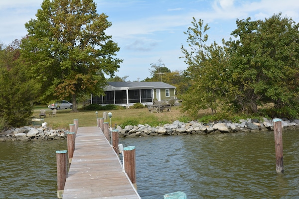 The Cottage from the dock that has water,electricity, and lights