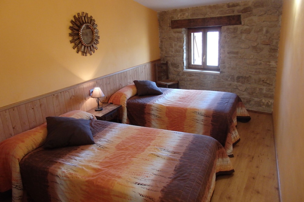 Old farmhouse restored in wood and stone