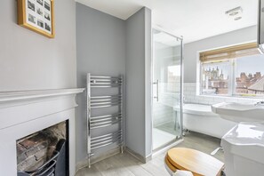 Bathtub, hair dryer, towels