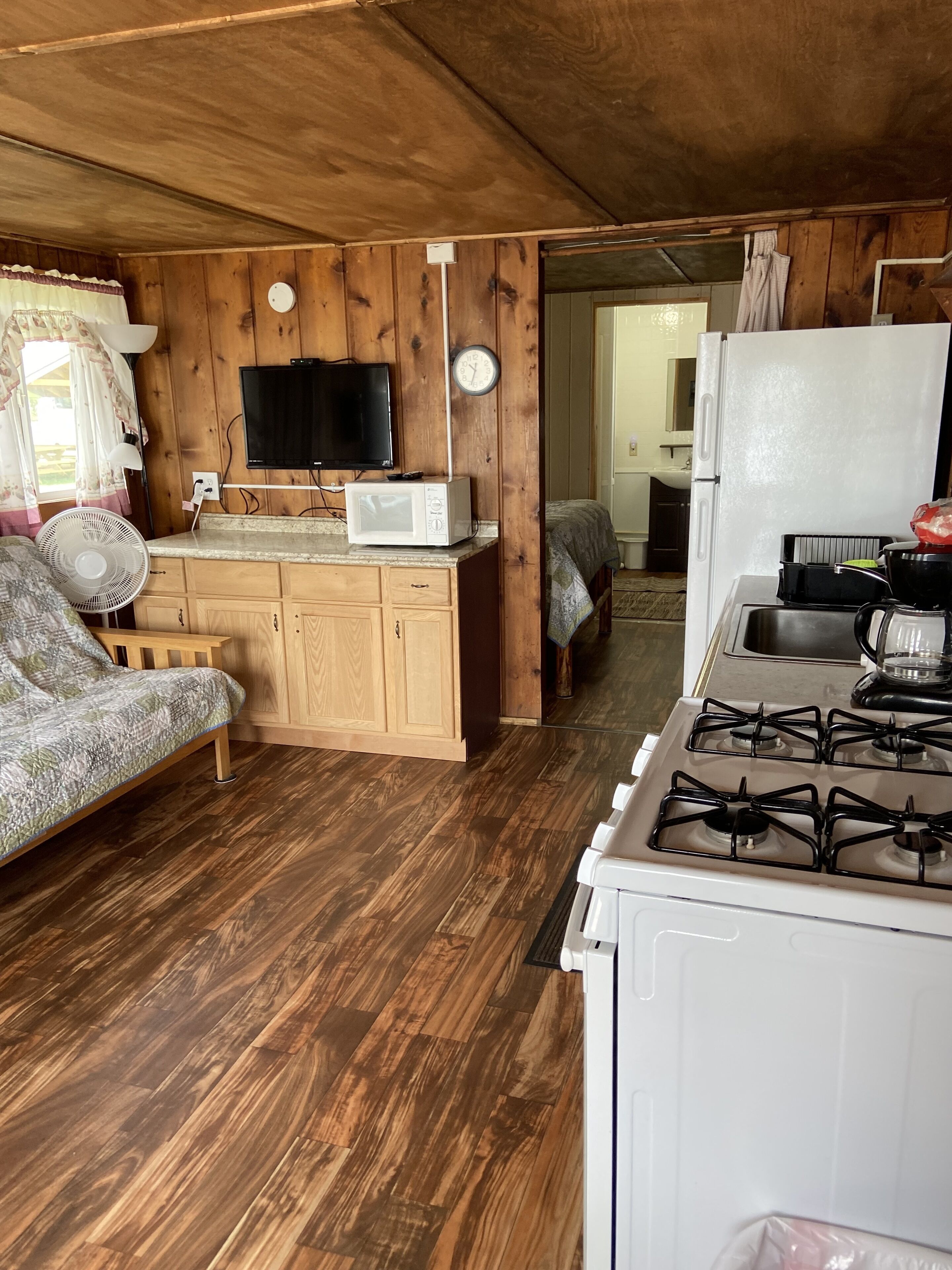 Cabin #2 is cozy and clean on the water's edge and sleeps 4.