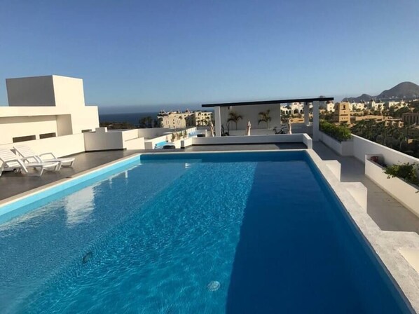 Pool - Modern Condo 2BR with Rooftop Pool Ocean Views  10 Min Walk to Medano Beach and (cabo san lucas)
