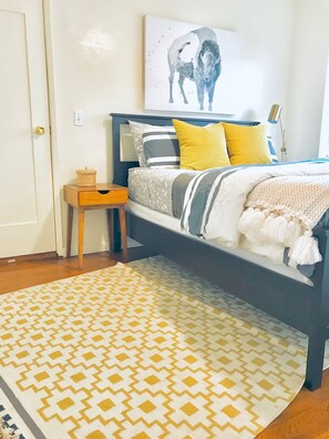 1 bedroom, desk, iron/ironing board, travel crib