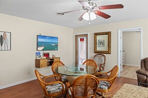 Enjoy meals in this stylish dining area with a round table and six comfortable chairs.