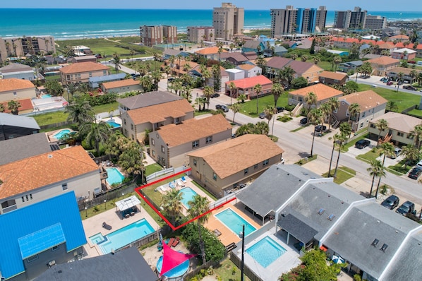 Aerial of the backyard and pool of 116 E Campeche #1,#2,#3