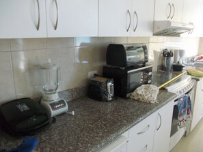 Fridge, microwave, oven, stovetop - Oceanfront Condo, Gorgeous Sunsets (Crucita)