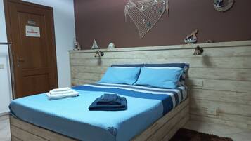 1 slaapkamer, een strijkplank/strijkijzer, reisbedje, gratis wifi