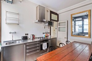 Fridge, oven, electric kettle, toaster