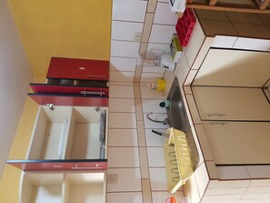 Fridge, microwave, electric kettle, cookware/dishes/utensils