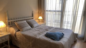 2 dormitorios, tabla de planchar con plancha, wifi y ropa de cama