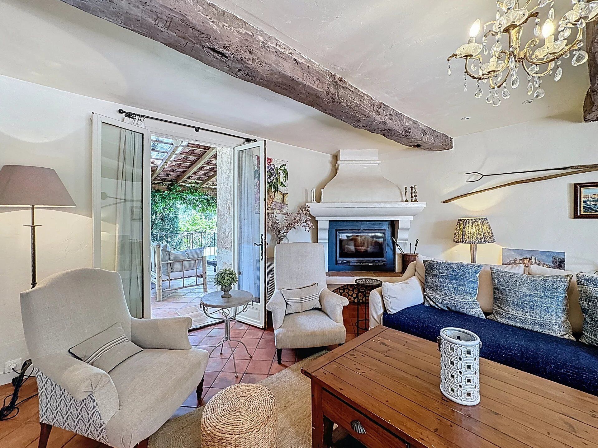 Seating room with smart TV, working fire, doors onto back terrace
