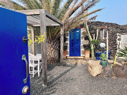 Small, stylishly furnished finca with two private secluded gardens