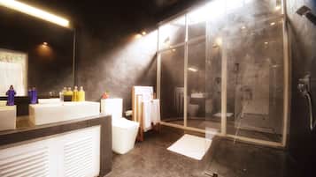 Separate bathtub and shower, rainfall showerhead, designer toiletries