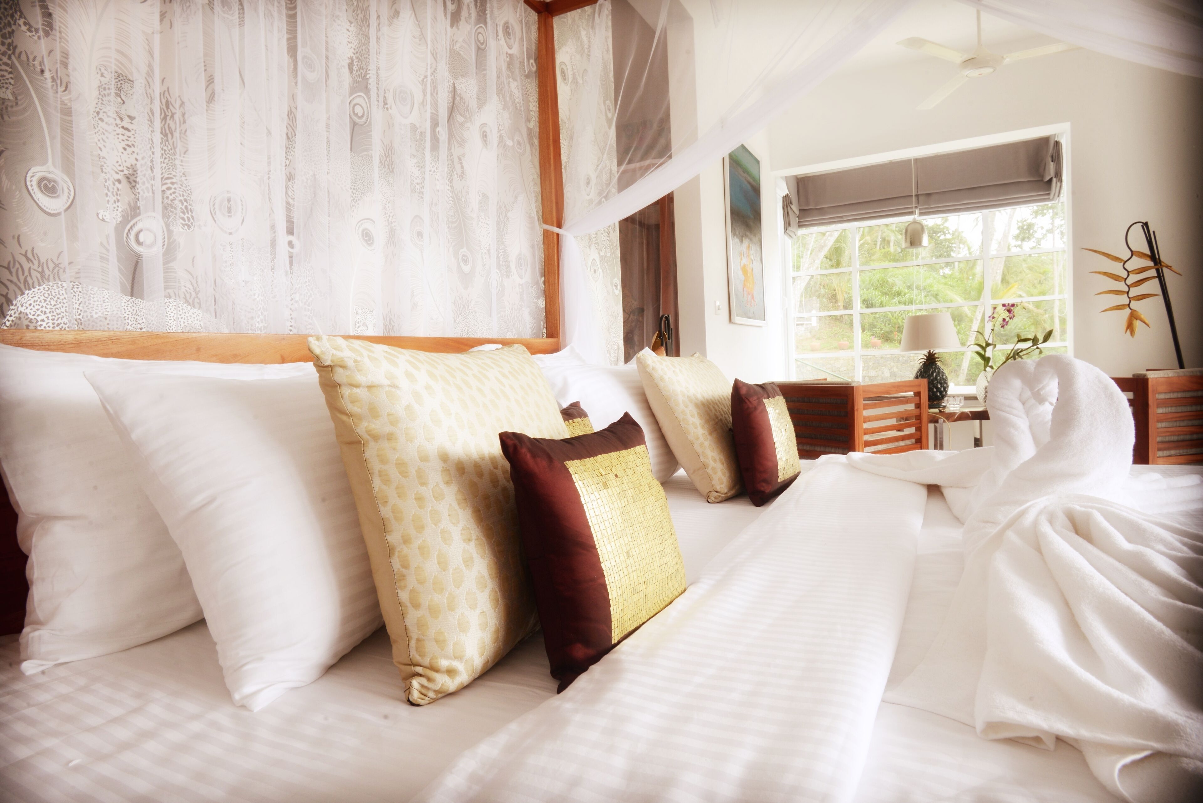 Egyptian cotton sheets, premium bedding, down duvets, in-room safe