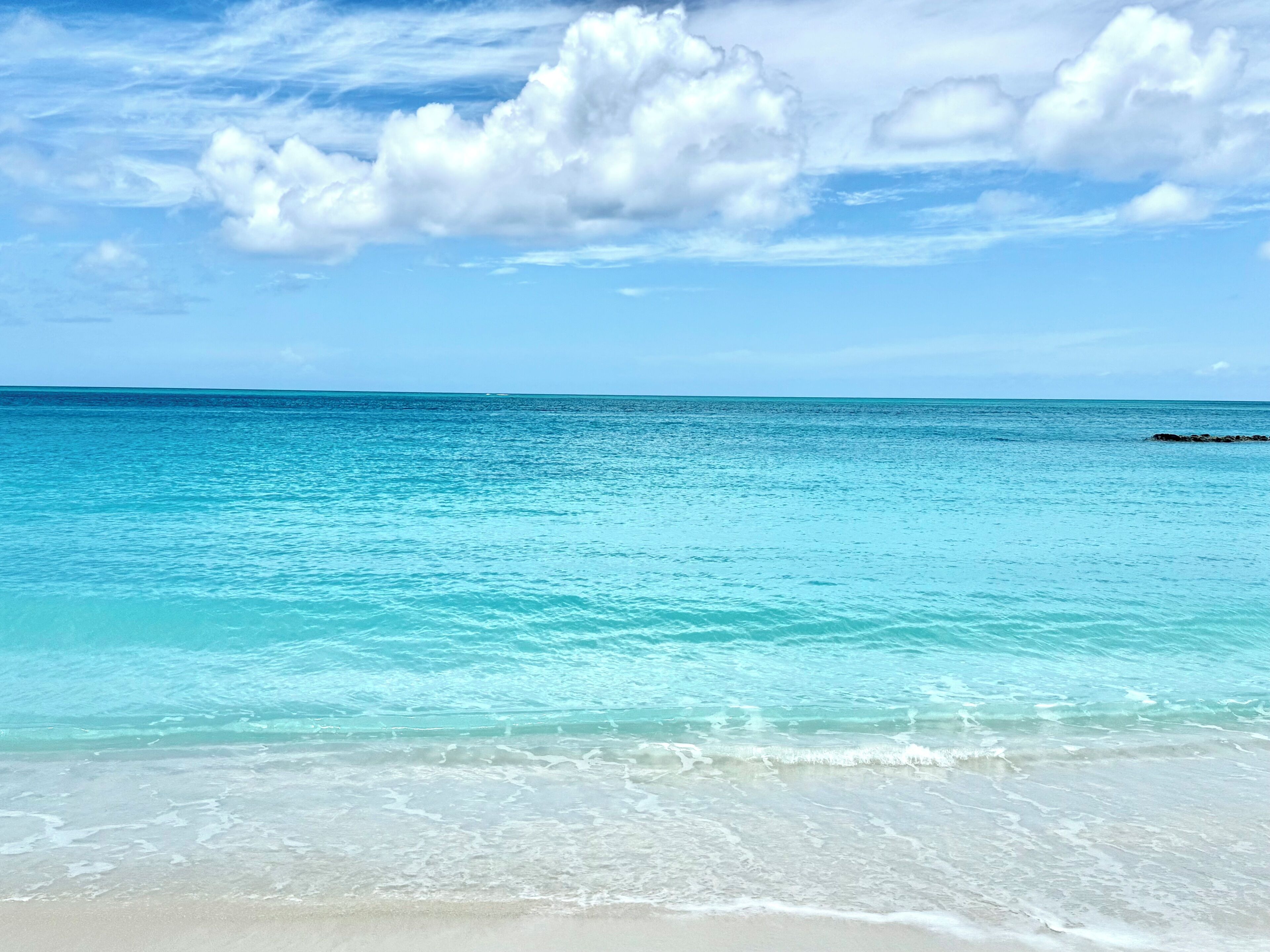 On the beach, sun-loungers, beach towels
