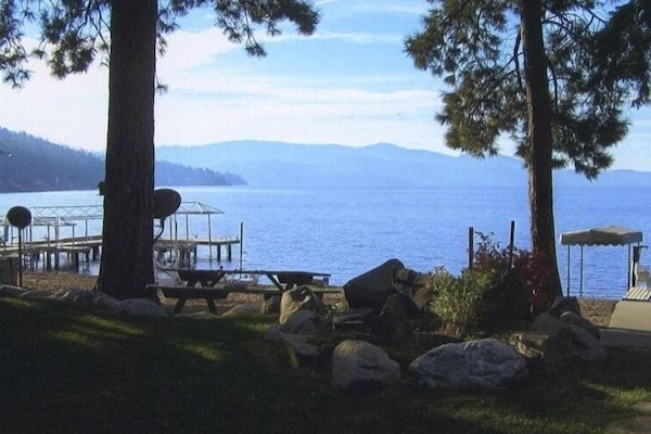 Amazing level beach with brand new dock, looking out from side of home