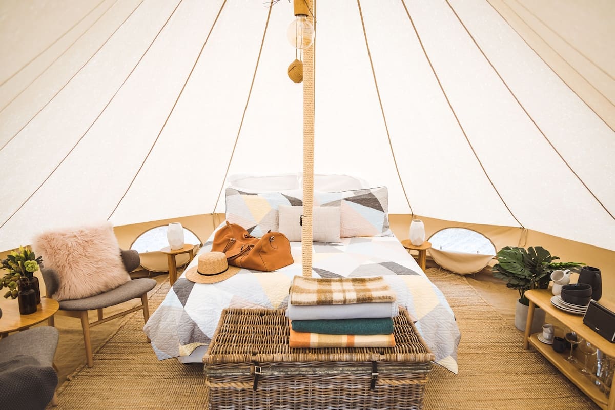 Cardigan Tent | Premium bedding, down duvets, pillow-top beds, individually decorated
