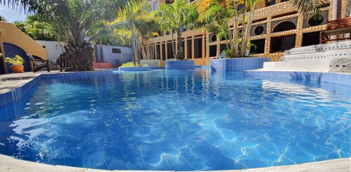 A Rustic Spanish, Adobe Style, Poolside Three Bedroom Villa