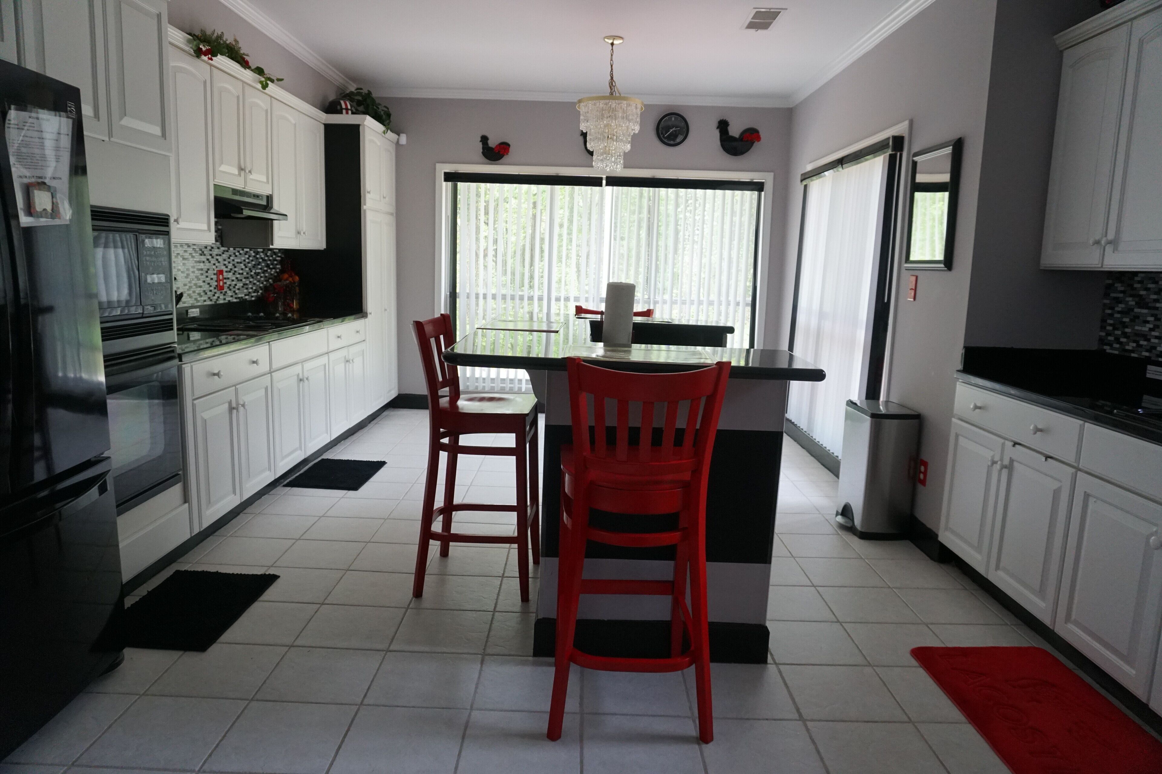 Coffee/tea maker, fridge, microwave, oven