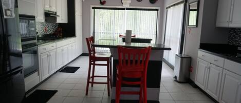 Coffee/tea maker, fridge, microwave, oven