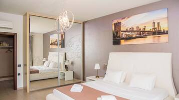 4 chambres, coffres-forts dans les chambres, fer et planche Ă repasser