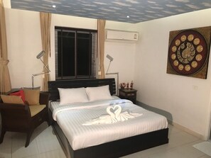 3 chambres, coffres-forts dans les chambres, fer et planche à repasser