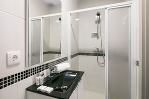 Hair dryer, bidet, towels, soap