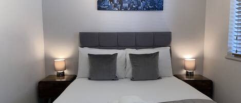 1 bedroom, desk, iron/ironing board, travel cot