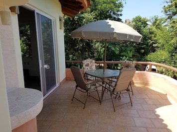 Terrace of Casita Molusco, the mollusk niche on left.