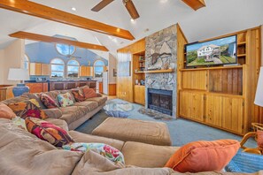 Televisión, reproductor de DVD, libros y videoteca 