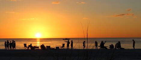On the beach, sun-loungers, beach towels