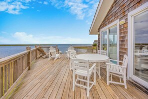 Outdoor dining - Soundfront Home w/ Private Boat Dock, Windsports Access, Kayaks, Paddle Boards (Avon)