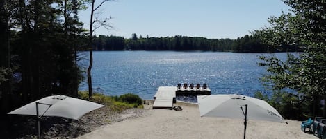 On the beach, sun-loungers