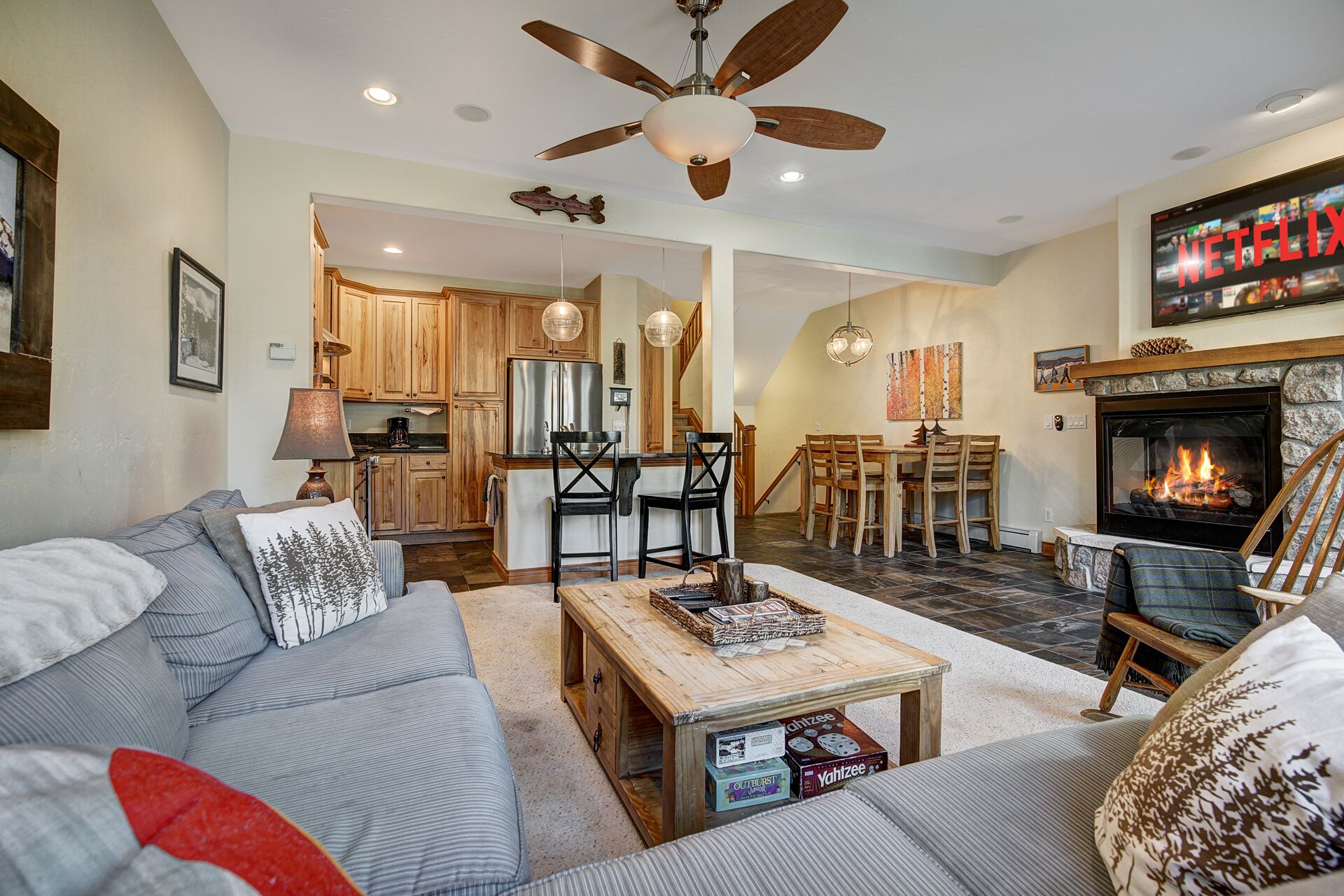 Prime Location: Riverfront Escape w/Private Hot Tub & Garage - Walk to Main St.
